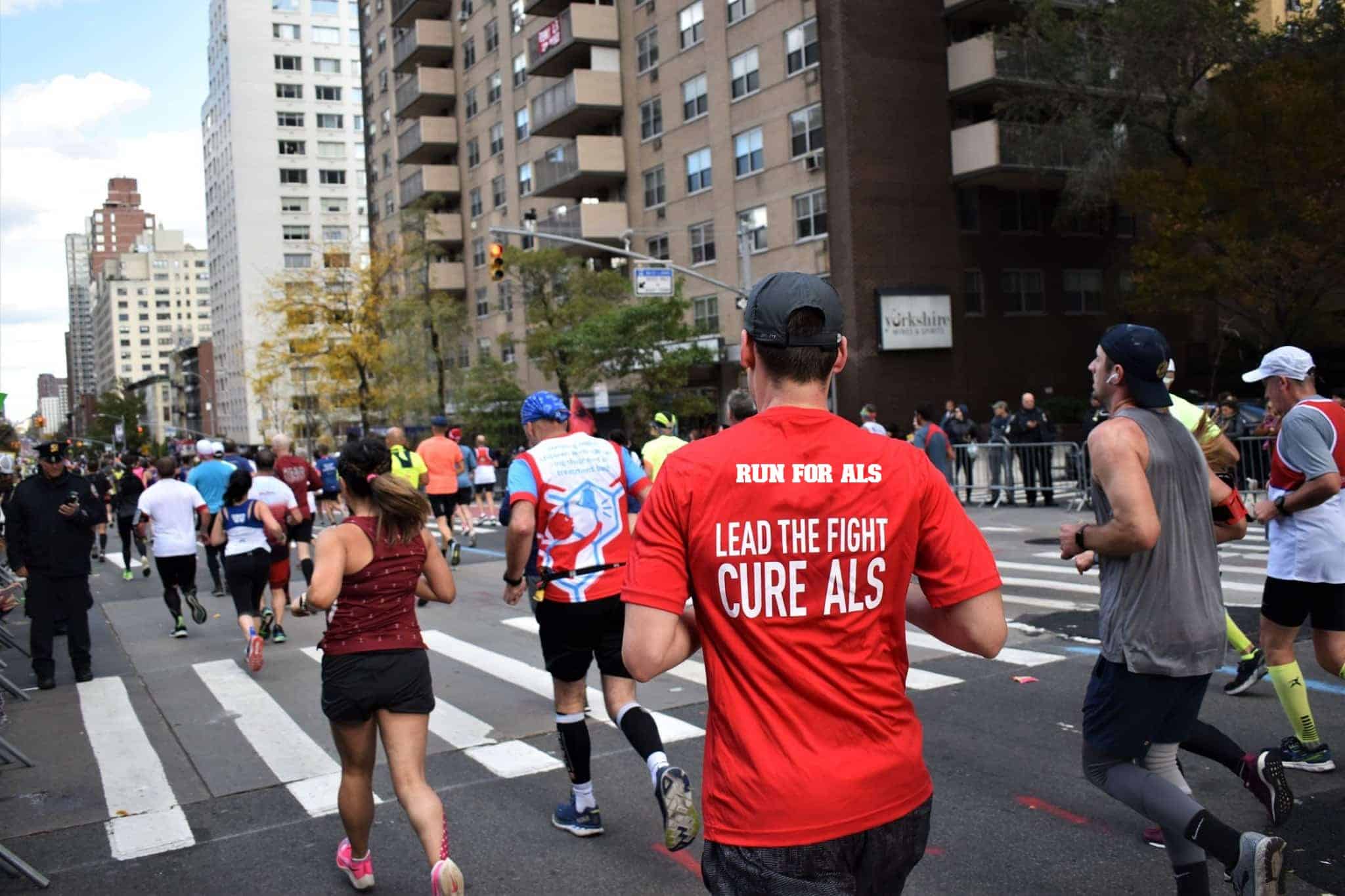 Guy running in a race for ALS.