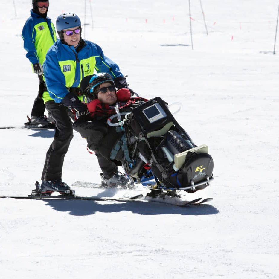 ALS Hero skiing down the hill at Eldora Mountain